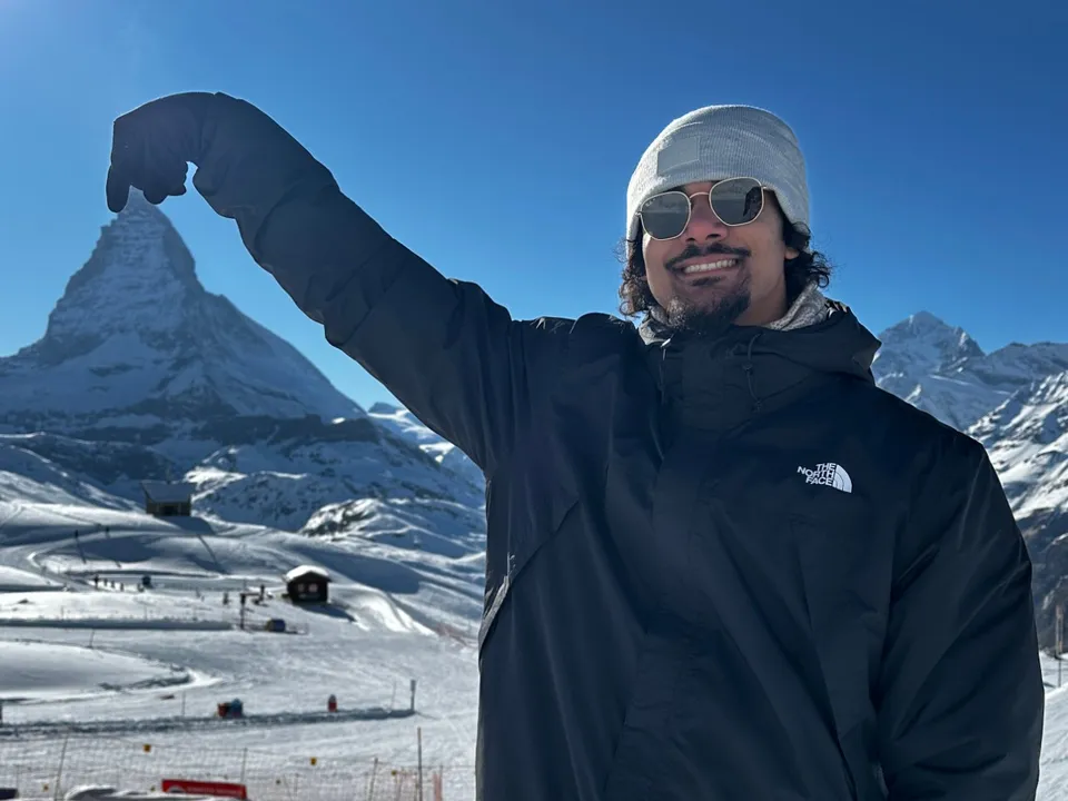 Eugene in the snow, pinching the top of the Matterhorn
